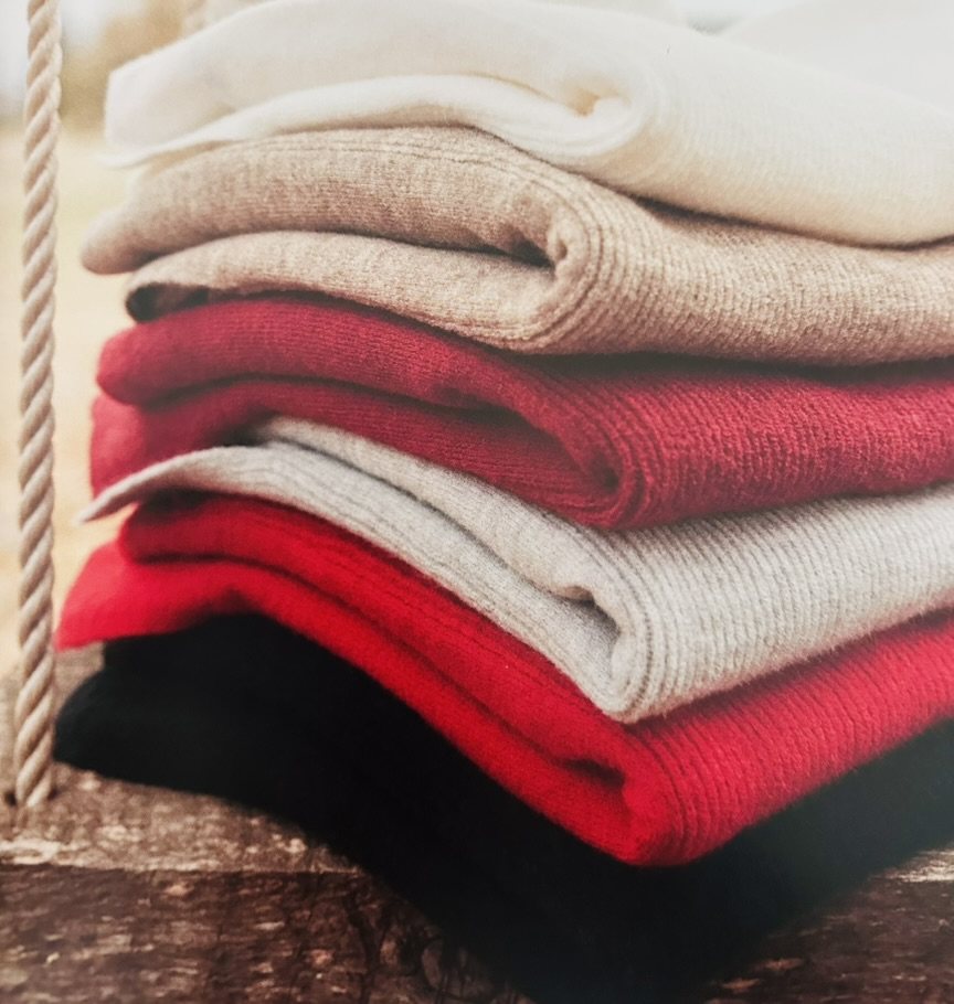 Avalin — folded sweaters in seasonal colorways